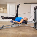 Total Gym EVOLVE leg pulley exercise