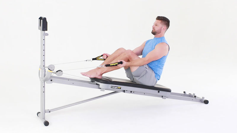 Total Gym biceps curl with spinal stretch demonstration