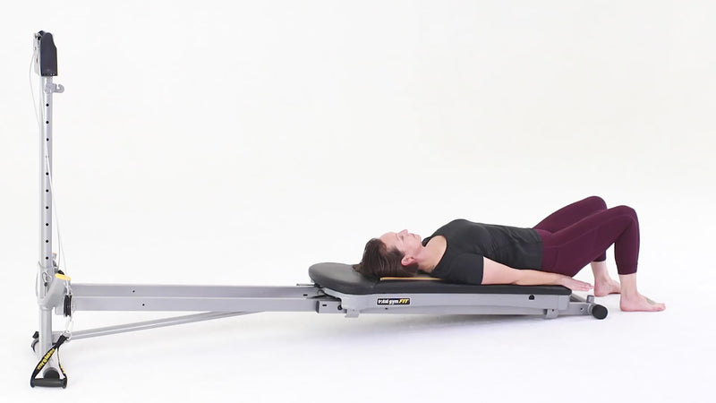 Total Gym Pilates hip roll demonstration