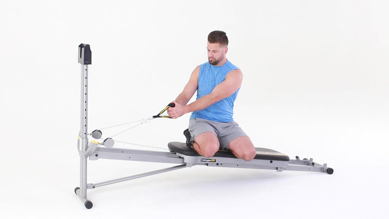 Total Gym kneeling torso rotation demonstration