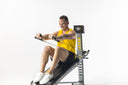 Man doing a seated chest press on the Total Gym FIT Anniversary Edition