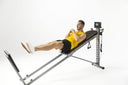 Man doing an incline core crunch on the Total Gym FIT Anniversary Edition
