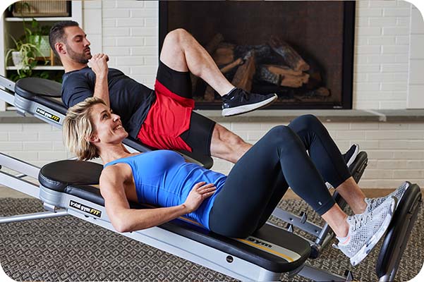 Squat exercise on Total Gym for core stability and balance