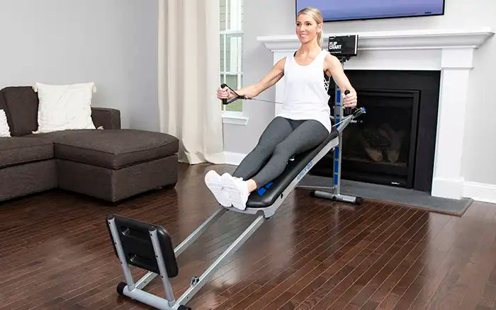 Person exercising on a Total Gym APEX G3 home gym at home