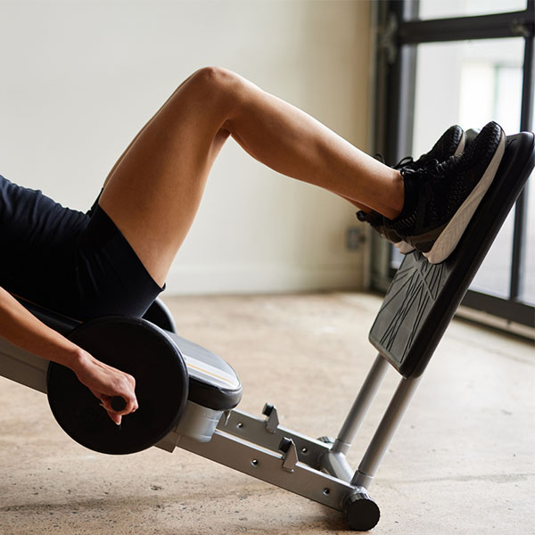 Total Gym with weight bar