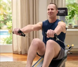 Man doing arm exercise on total gym